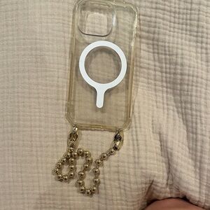 OSSA New York iPhone 14 Pro with gold ball chain